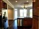 Bright eat-in kitchen features an island with stainless dishwasher and breakfast bar sink at 3306 Chastain Ridge Dr, Marietta, GA 30066