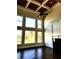 Bright living room with large windows, a fireplace, and dark hardwood floors at 3306 Chastain Ridge Dr, Marietta, GA 30066