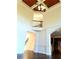 Elegant living room with high ceilings, hardwood floors, and view of the kitchen at 3306 Chastain Ridge Dr, Marietta, GA 30066