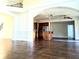 Open-concept living area with hardwood floors, light walls, and modern kitchen at 3306 Chastain Ridge Dr, Marietta, GA 30066