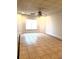 Bright room with tile flooring, a window, and a ceiling fan at 3306 Chastain Ridge Dr, Marietta, GA 30066