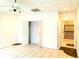 Well-lit room with tile flooring, closet, and a doorway leading to stairs at 3306 Chastain Ridge Dr, Marietta, GA 30066