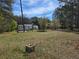 Rural home surrounded by mature trees and ample yard space at 4064 Post Rd, Winston, GA 30187
