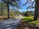 Long driveway to the home featuring beautiful mature trees at 4064 Post Rd, Winston, GA 30187