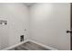 Laundry area with wood floors and modern hookups for washer and dryer at 4064 Post Rd, Winston, GA 30187