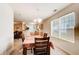 Inviting dining room with a view to the kitchen and living area at 10892 Big Sky Dr, Hampton, GA 30228