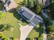 The aerial view shows a lush lawn, mature landscaping, and a well-maintained exterior, all adding to the property's charm at 1435 Willis Lake Nw Dr, Kennesaw, GA 30152
