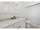 Clean bathroom with vanity, granite countertops, updated fixtures and modern finishes at 1435 Willis Lake Nw Dr, Kennesaw, GA 30152