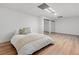 The spacious bedroom features neutral walls, an accent rug, and ample closet space, offering versatility at 1435 Willis Lake Nw Dr, Kennesaw, GA 30152