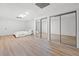 Bright bedroom with sliding closets offers generous space and a simple, clean aesthetic for relaxation at 1435 Willis Lake Nw Dr, Kennesaw, GA 30152