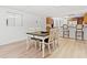 The dining area adjoins the kitchen, featuring a table and chairs, offering a functional space for meals at 1435 Willis Lake Nw Dr, Kennesaw, GA 30152