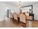 Comfortable dining room featuring hardwood floors and a large mirror with detailed furnishings at 1435 Willis Lake Nw Dr, Kennesaw, GA 30152