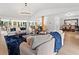 Spacious living area with ample seating, hardwood floors, and lots of natural light at 1435 Willis Lake Nw Dr, Kennesaw, GA 30152