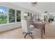 Bright office with many windows and dark wooden desk at 1435 Willis Lake Nw Dr, Kennesaw, GA 30152