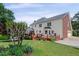 The home features a spacious backyard with a multilevel deck, ideal for outdoor gatherings and relaxation at 3331 Lockwood Sw Ct, Lilburn, GA 30047