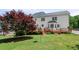 A beautiful backyard with a multi-level wooden deck that is great for entertaining or relaxing at 3331 Lockwood Sw Ct, Lilburn, GA 30047
