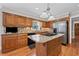 Stylish kitchen boasting granite countertops, wooden cabinetry, and modern appliances for a delightful cooking experience at 3331 Lockwood Sw Ct, Lilburn, GA 30047