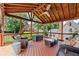 Outdoor living space with wooded backyard views at 3331 Lockwood Sw Ct, Lilburn, GA 30047