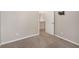 Neutral-colored bedroom with carpet, white trim, and door to hall at 3471 Chastain Glen Ne Ln, Marietta, GA 30066