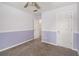Bedroom with gray carpet, white trim and paneled walls at 3471 Chastain Glen Ne Ln, Marietta, GA 30066