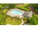 Aerial shot of the community pool with lounge chairs and landscaped surroundings at 3471 Chastain Glen Ne Ln, Marietta, GA 30066