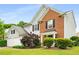 Traditional two-story home with brick and siding, and a well-manicured front yard at 3471 Chastain Glen Ne Ln, Marietta, GA 30066
