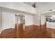 Open-concept living room featuring hardwood floors with entryways into other rooms at 3471 Chastain Glen Ne Ln, Marietta, GA 30066