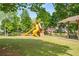 Community playground with a slide, climbing wall, swing set, and picnic area at 3471 Chastain Glen Ne Ln, Marietta, GA 30066
