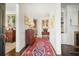 Elegant foyer with hardwood floors, a decorative rug, and classic furnishings at 45 Paces West Nw Dr, Atlanta, GA 30327