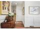Tastefully decorated hallway with wooden floors, decorative painting and classic trim work at 45 Paces West Nw Dr, Atlanta, GA 30327
