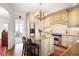 Traditional kitchen with granite countertops, an island, and stainless steel appliances at 45 Paces West Nw Dr, Atlanta, GA 30327