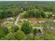Aerial view of the neighborhood showcasing lush trees, streets, and residential homes at 4701 Riverwood Cir, Decatur, GA 30035