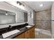 Modern bathroom with a dual sink vanity, and glass shower at 4701 Riverwood Cir, Decatur, GA 30035