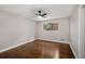 Simple bedroom with hardwood floors and a ceiling fan at 4701 Riverwood Cir, Decatur, GA 30035