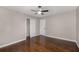 Bedroom with hardwood floors, ceiling fan and closet at 4701 Riverwood Cir, Decatur, GA 30035