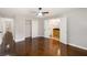 Cozy bedroom with wood flooring, ceiling fan, closet and attached bathroom at 4701 Riverwood Cir, Decatur, GA 30035