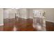 Open living room features gleaming hardwood floors and ample space for entertaining at 4701 Riverwood Cir, Decatur, GA 30035