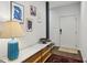 Bright entryway featuring modern art, stylish console table, and dark wood flooring at 584 Bismark Ne Rd, Atlanta, GA 30324