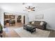 Open layout connects kitchen, dining, and living area creating versatile and inviting space with modern finishes and furniture at 165 6Th St, Auburn, GA 30011