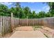 A fenced backyard with room for outdoor activities at 1880 Garbrooke Cv, Lawrenceville, GA 30046