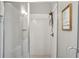 Modern bathroom boasts a glass-enclosed shower with decorative tile surround and a mounted shower head at 2020 Bixby Se St, Atlanta, GA 30317