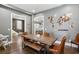 Stylish dining area with a wooden table, bench seating, and decorative wall decor at 2020 Bixby Se St, Atlanta, GA 30317