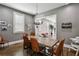 Cozy dining room with a wooden table, comfortable seating, and ample natural light at 2020 Bixby Se St, Atlanta, GA 30317
