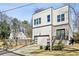Striking exterior view of a two-story home with a garage, complementing its neatly kept lawn at 2020 Bixby Se St, Atlanta, GA 30317