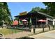 Modern building with an outdoor dining area and black awnings at 2020 Bixby Se St, Atlanta, GA 30317