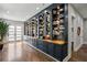 Elegant hallway with extensive built-in shelving and polished hardwood flooring at 2020 Bixby Se St, Atlanta, GA 30317