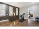 A hallway with hardwood floors and an exercise bike at 2020 Bixby Se St, Atlanta, GA 30317