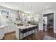 Modern kitchen boasts stainless steel appliances, granite countertops, and a stylish island with bar seating at 2020 Bixby Se St, Atlanta, GA 30317