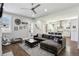 Open-concept living area flows into the kitchen, featuring a comfy sectional and modern decor at 2020 Bixby Se St, Atlanta, GA 30317