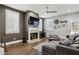 Warm living room featuring a fireplace, plantation shutters and a comfortable seating arrangement at 2020 Bixby Se St, Atlanta, GA 30317